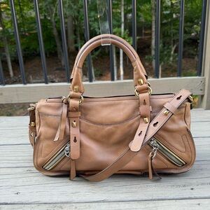 Dissona leather handbag purse bag